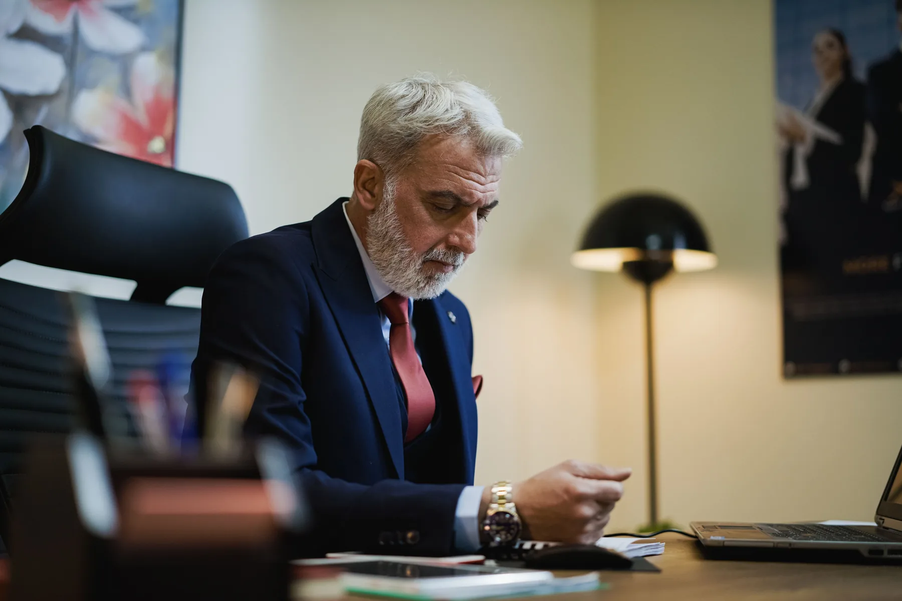 Senior executive reviewing business materials